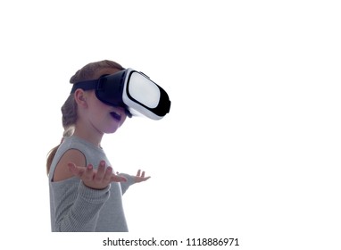 Girl using a virtual reality headset . Isolated on white background - Shutterstock ID 1118886971