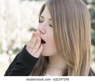 Girl Is Very Bored Outdoor, The Lady Is Not Interested