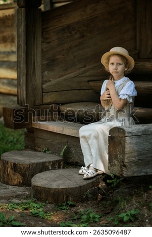 Girl in vintage Russian-style dress, traditional attire