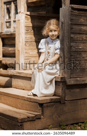 Girl in vintage Russian-style dress, traditional attire