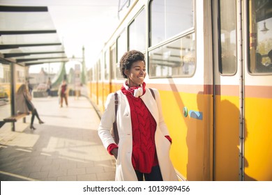 Girl waiting the bus - Powered by Shutterstock