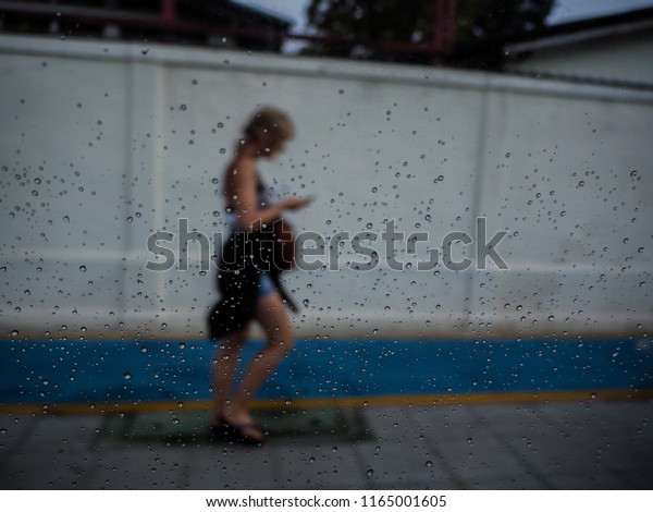 Girl Walking Alone Rain Stock Photo Edit Now 1165001605