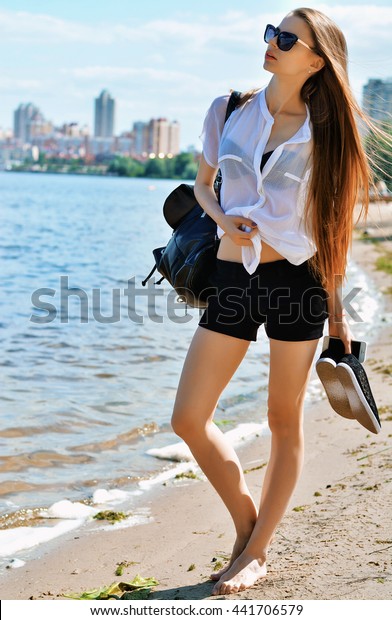 girl barefoot in shoes