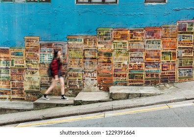 Girl Walking In The Colorful Street In Hong Kong City