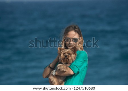 Similar – Junge Frau mit blondem Labrador am Ostseestrand