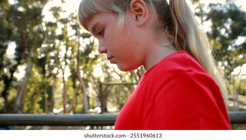 Girl walking on obstacle in boot camp - Powered by Shutterstock