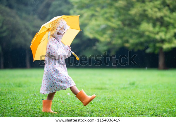 Girl Walking Umbrella On Rainy Day Stock Photo 1154036419 | Shutterstock
