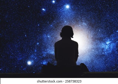 Girl watching the space. Stars are digital illustration.