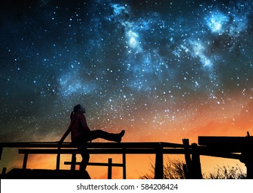 Girl Watching The Stars In Night Sky