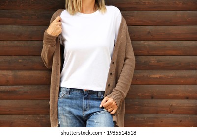 Girl Wearing Blank T Shirt With Denim And Cardigan. Rustic White Shirt Mock Up