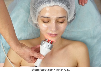 Girl Wearing Collagen Mask. Radio Frequency Skin Tightening, Face.