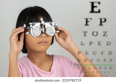 Girl Wearing Glasses And Blur Eye Chart