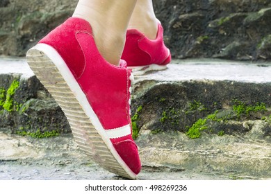 Girl Wearing Red Shoes Steps Up.