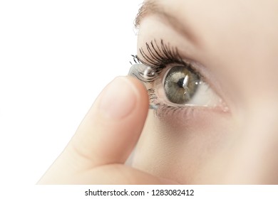 girl wearing soft contact lenses close-up macro isolated on white background - Shutterstock ID 1283082412