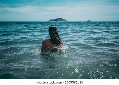 Girl With Wet Hair In The Sea