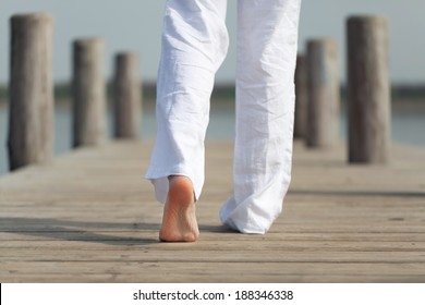 Girl With White Linen Trousers Enjoy The Summer, Barefoot