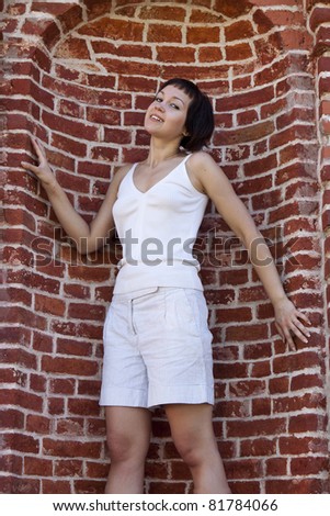 Similar – Woman at the window of a parking garage