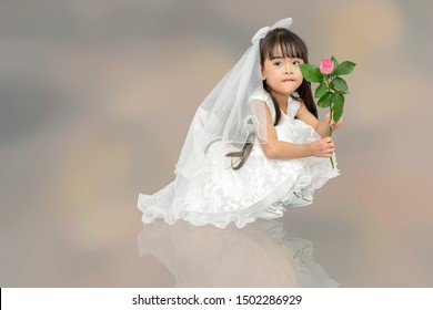 Girl In White Wedding Dress On Back Drop.