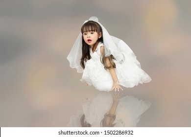 Girl In White Wedding Dress On Back Drop.