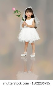 Girl In White Wedding Dress On Back Drop.