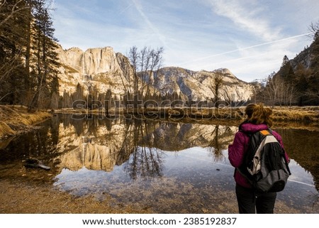 Girl in winter in Yosemite National Park, United States Of America