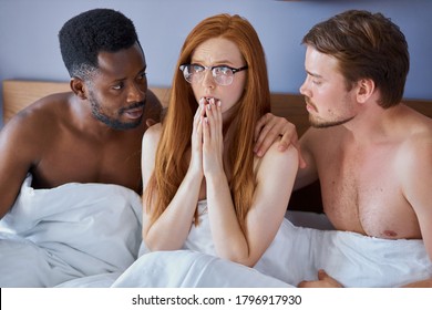 girl woke up with two diverse men, she is in shock, redhead woman does not remember with whom she spent the night with