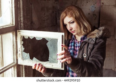 A Girl, A Woman Is Destroyed In A House Fire Near The Broken Window