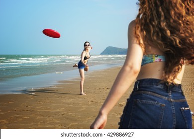 Girl Woman Women Coast Frisbee Beach Relax Concept - Powered by Shutterstock