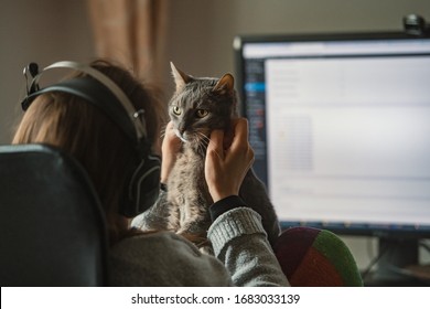 Girl Working From Home With Her Cat