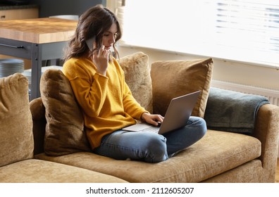 Girl working at home with a laptop during quarantine