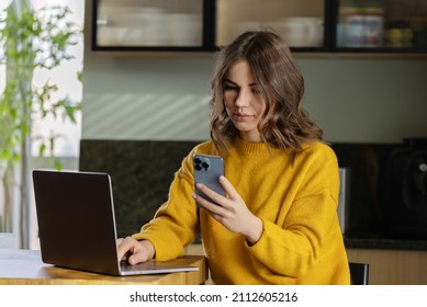 Girl Working At Home With A MacBook Pro  During Quarantine