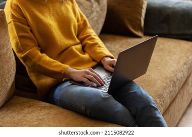 Girl Working At Home With A MacBook Pro During Quarantine