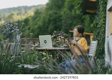 Girl working on robotic arm. Concept robotics, science, IT technologies and programming for girls. Concept of young girls in science. - Powered by Shutterstock