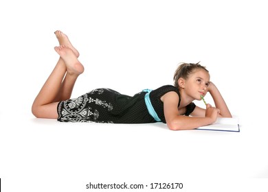 Girl Writing In Journal, Looking Up And Away