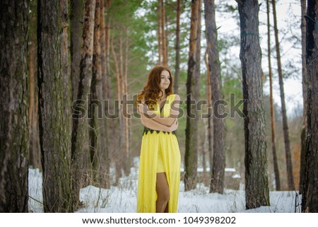 Similar – Woman in front of a yellow beach house