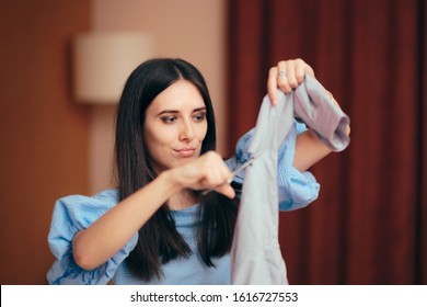 Girlfriend Having Jealousy Crisis Cutting Male Shirts. Angry wife seeking revenge for infidelity and lies