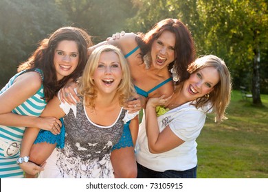 Girlfriends Are Having Fun In The Park