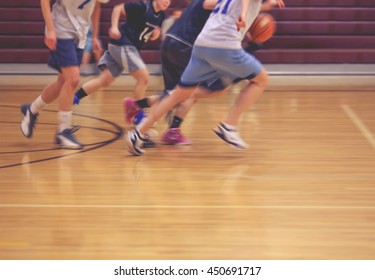 A Girls Basketball Team Running Up Or Down The Court (no Point Of Focus) Toned With A Retro Vintage Instagram Filter Effect App Or Action 