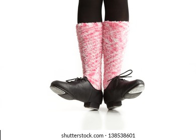 Girl's Dancing Feet In Tap Shoes And Pink Socks