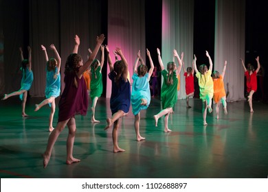 Girls are dancing on stage.