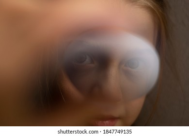 Girl's Eyes Are Looking Through Piece Of Paper, Absract Face