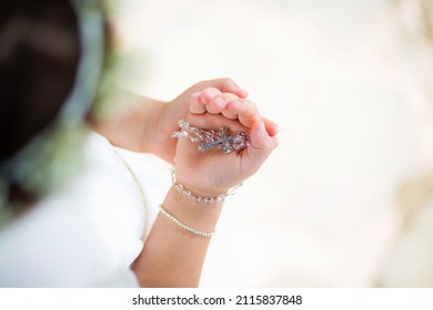 Girl's first rosary for communion