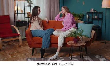 Girls Friends Siblings Chatting Talking, Make Support Conversation Consulting Together. Two Female Women Couple Family Secrets Gossip, News Rumors Having Great Fun Time Together At Home In Living Room