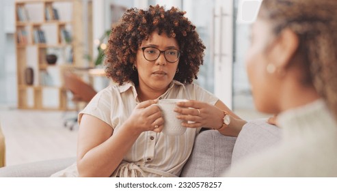 Girls, friendship and smile of happy women chatting, speaking or serious discussion. Friends, woman and talking on sofa, laughing and bonding in home living room. - Powered by Shutterstock