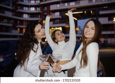 Girls, Girlfriends Having Fun Near The Golden Car. Girls All In White, At A Bachelorette Party. 