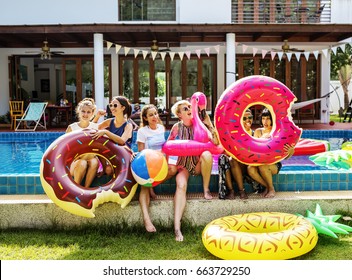 Girls Group At The Pool For Summer Party