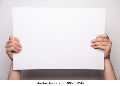 Girls Hand Holding A White Board