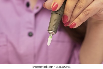 A Girl's Hand With A Milling Machine