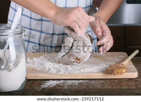 Similar – Foto Bild Frau beim Kneten von handwerklichem Brot auf Holztisch