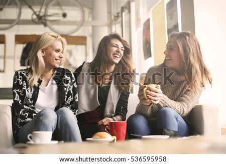 Girls having fun at home, laughing. 